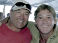 Diver Pete West in one of the last photos of Steve Irwin, the beloved "Crocodile Hunter" who lost his life in a tragic stingray accident, is being remembered by his former cameraman and friend, Justin Lyons, in a new interview that details Irwin's final moments. Lyons worked as Irwin's "right-hand man" for more than 15 years of his career prior to his death in 2006, when he was stabbed in the chest by a stingray. Lyons details the moments prior to the incident and what brought the two to filming location in the first place. A clip of the interview can be viewed below. "I remember it really, very clearly," Lyons said. "We had been working on a documentary called 'Ocean's Deadliest,' basically looking at the deadliest creatures in the ocean ... we're about eight days in filming crocodiles and sea snakes I think and we were looking for tiger sharks. We'd had a bit of bad weather. Steve's like a caged tiger, when he couldn't do something, particularly on a boat, he said, 'Let's go and do something.'" Lyons goes on to give details about the moment he realized Irwin was dead, telling the hosts his last words he heard him say were "I'm dying." Lyons clarifies that stingrays are traditionally calm sea animals, but may have mistaken Irwin's shadow for a tiger shark. "We'd only been motoring for a few minutes and we found a massive stingray," he said. "Stingrays are normally very calm, if they don't want you to be around them, they'll swim away. They're very fast swimmers ... I had the camera on and I thought this was going to be a great shot, it's going to be in the doc for sure, and then all of the sudden it propped on its front, and started stabbing wildly with its tail, hundreds of strikes in a few seconds." "It probably thought Steve's shadow was a tiger shark, which feeds on them very regularly," he continued. "And so it started to attack him. I panned with the cameras, the stingray swam away. I didn't even know it had caused any damage, it wasn't until I panned the camera back that Steve was standing in a huge pool of blood that I realized something had gone wrong."